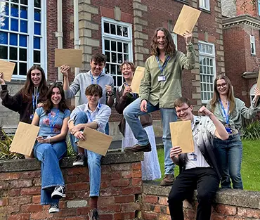 Students holding results