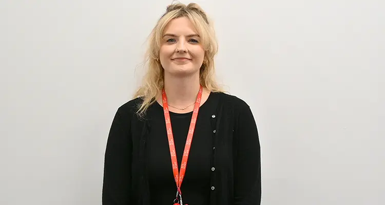 Professional head shot of female staff member smiling