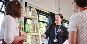 Student showing teachers their popup stand