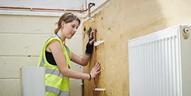 Student securing water pipes